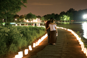 Couple looking at luminaries on Relay track